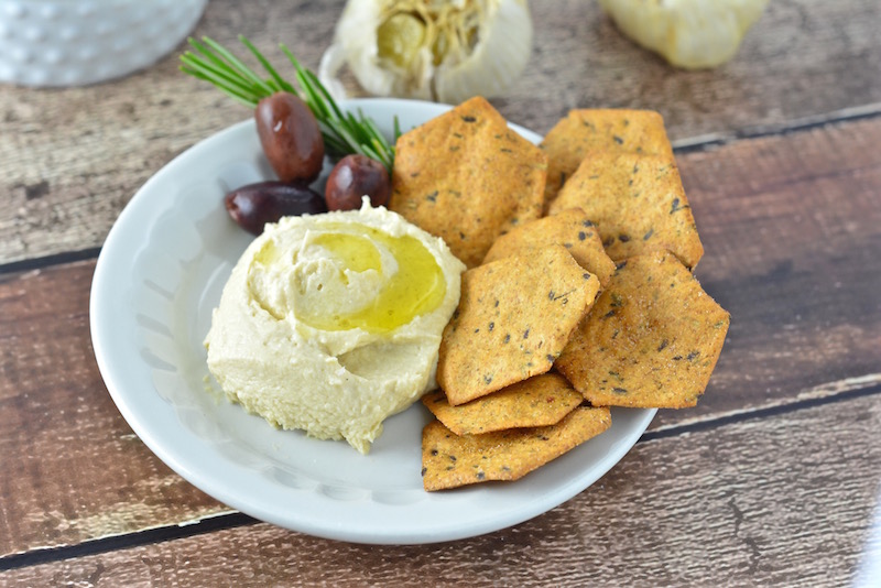 Roasted garlic hummus is your new go-to dip for any occasion. So easy to make at home!