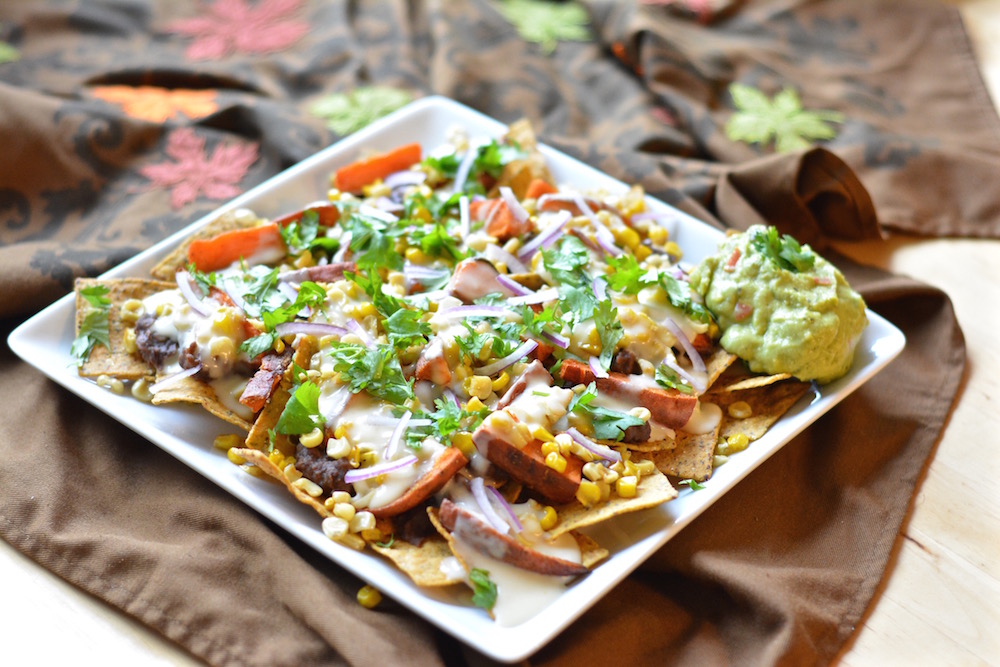These sweet potato nachos are doubling down on deliciousness. A quick weeknight dinner or party pleasing platter!