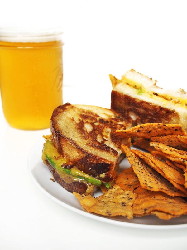 There is no way better beer food than this crunchy, melty nacho grilled cheese.