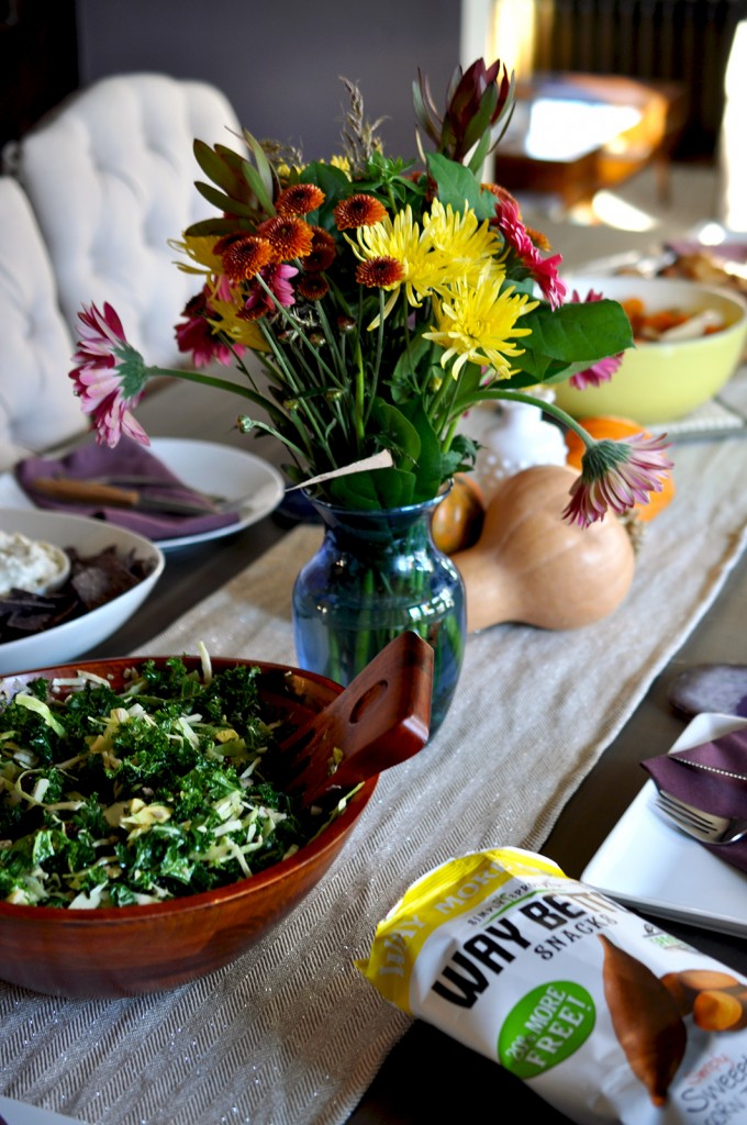 Flowers and a few seasonal items make for an easy and inexpensive tablescape. A neutral runner adapts to all holidays!