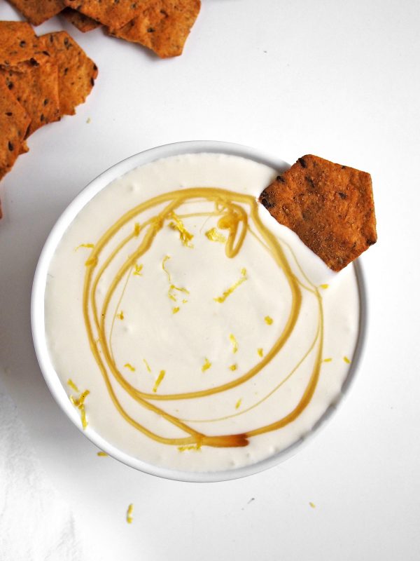 A drizzle of honey tops this simple 3-ingredient goat cheese dip for easy entertaining.