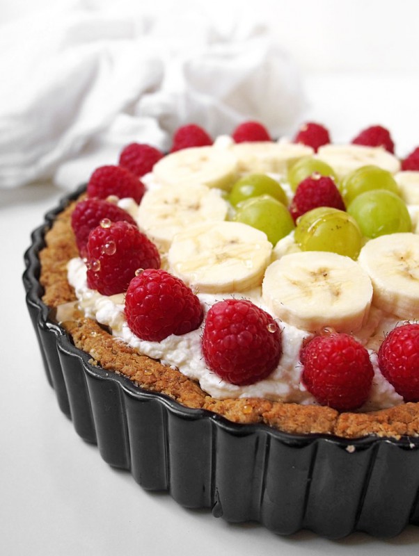 Local honey, fresh fruit, and a sweet potato chip crust will make this fruit tart a winning dessert for any occassion.