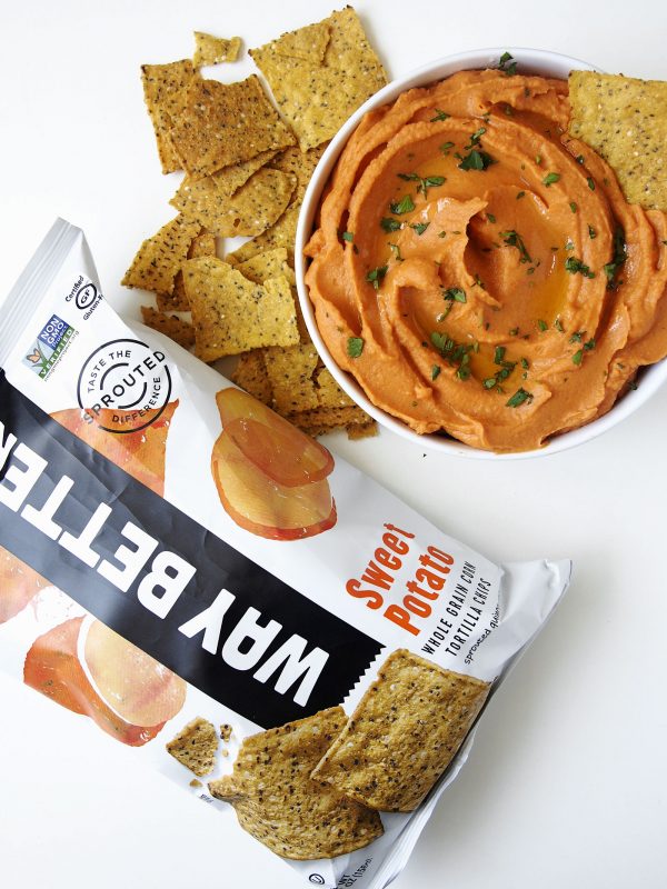Sweet, salty, and crunchy sweet potato chips are the perfect pair for roasted red pepper hummus!