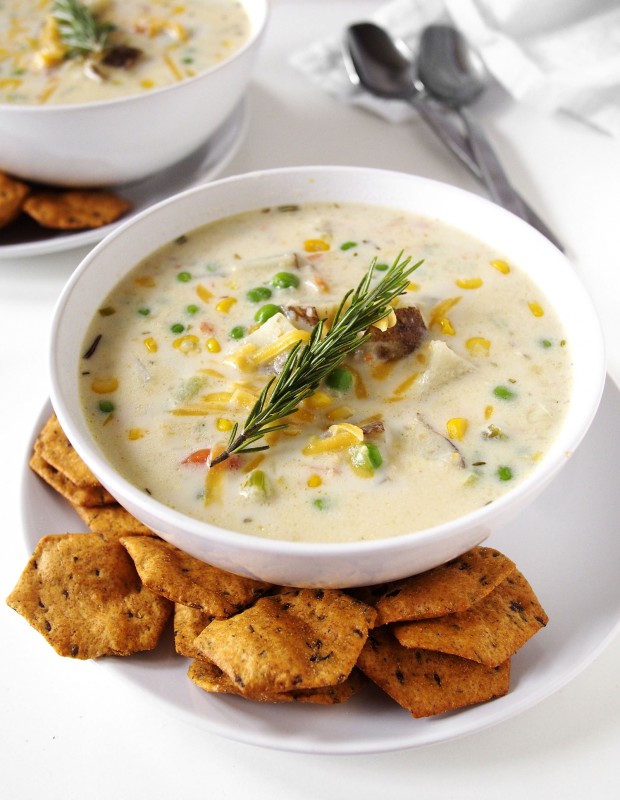 This light, springy veggie chowder is accompanied perfectly by a pop of herbaceous Rosemary and Olive Oil sprouted crackers.