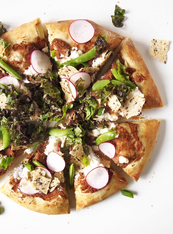 A spring veggie pizza full of crunch: fresh garden radishes, snap peas, and nacho cheese chips will make this your new favorite family pizza!
