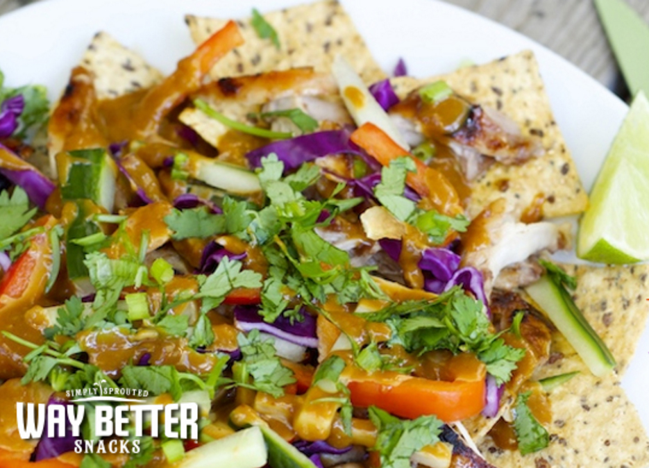 Thai touchdown nachos for the win! These nachos with a kick build a tasty base from Simply Spicy Sriracha chips.