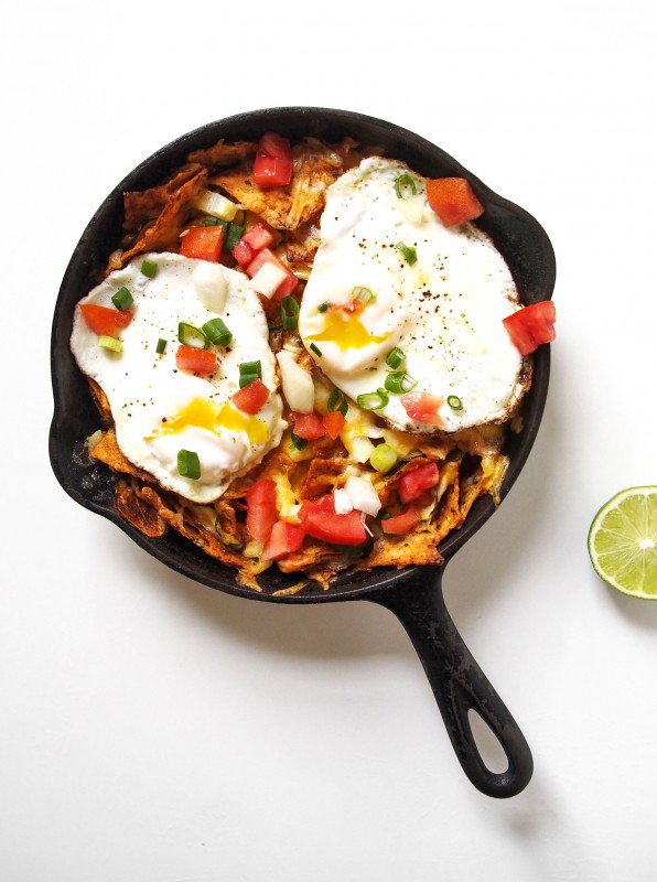 Who doesn't love a perfectly poached egg? This zucchini sriracha chilaquiles will up your brunch game!
